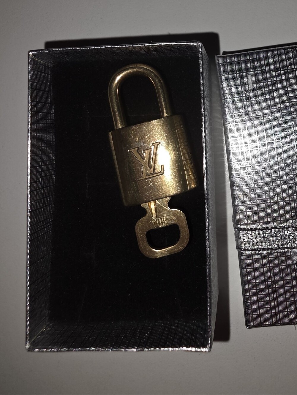 Louis Vuitton Gold Padlock Key Holder  Accessories